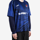 Navy top worn by a person, showing the top fit