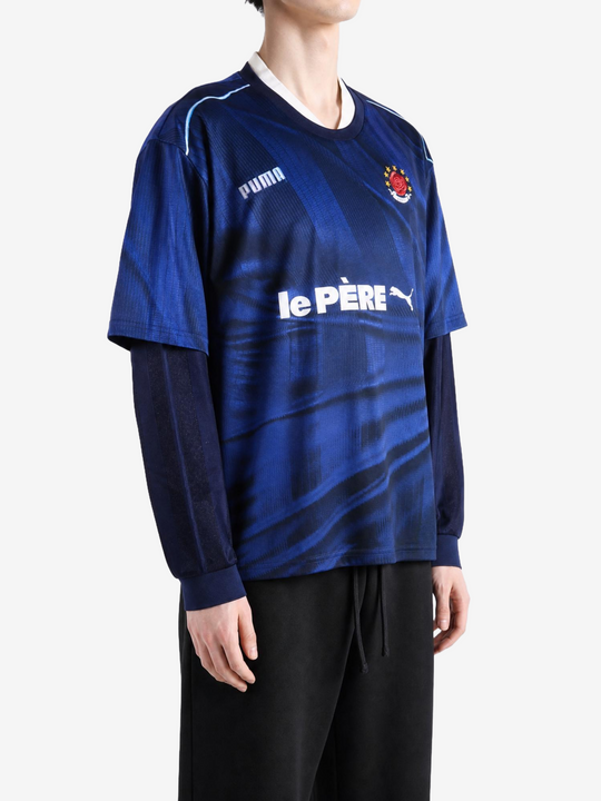 Navy top worn by a person, showing the top fit