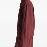 Red jacket worn by a person, showing the jacket's fit