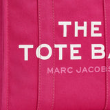 Close up of pink bag, showing brand logo