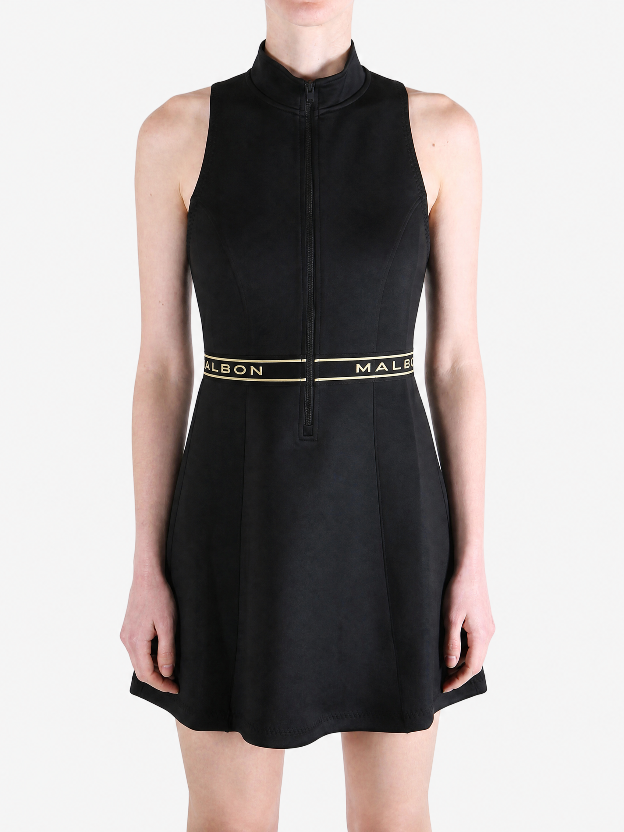 Black dress worn by a person, showing the dress fit