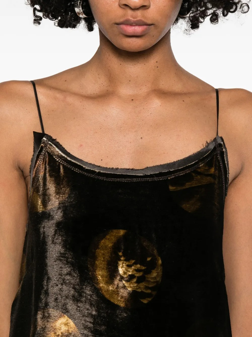 Close up of brown dresses, showing texture of the  fabric