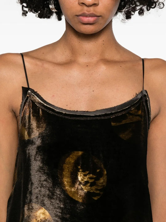 Close up of brown dresses, showing texture of the  fabric