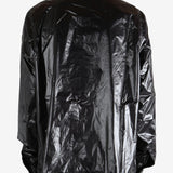 Black jacket worn by a person, showing the jacket's fit