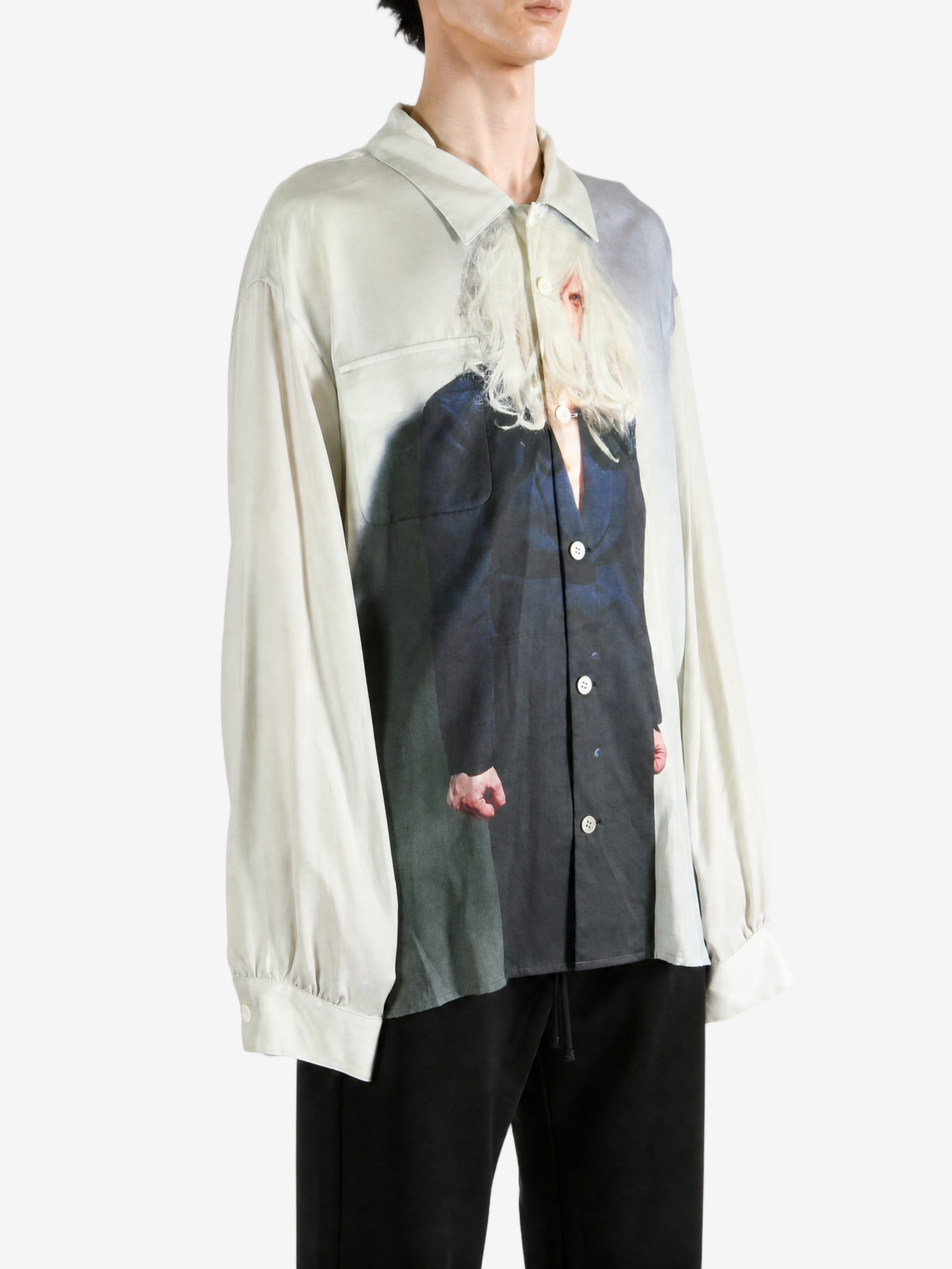Tan shirt worn by a person, showing the shirt fit