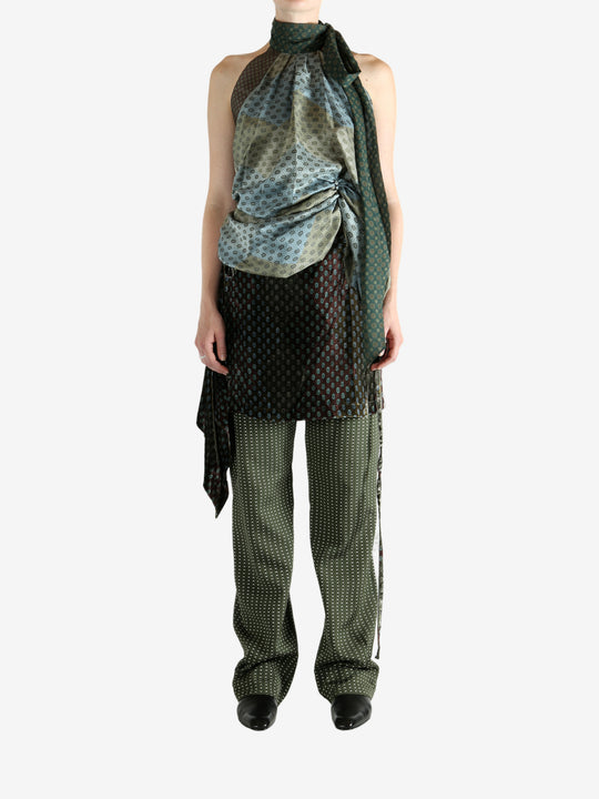 Green top, full body view