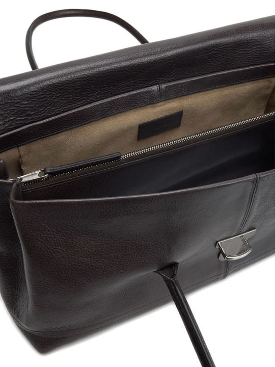 Close up of the black bag, showing texture of the leather fabric