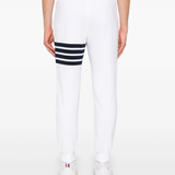 White pants worn by a person, showing the white pants fit