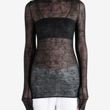 Black top worn by a person, showing the top fit