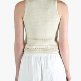 White vest worn by a person, showing the vest's fit