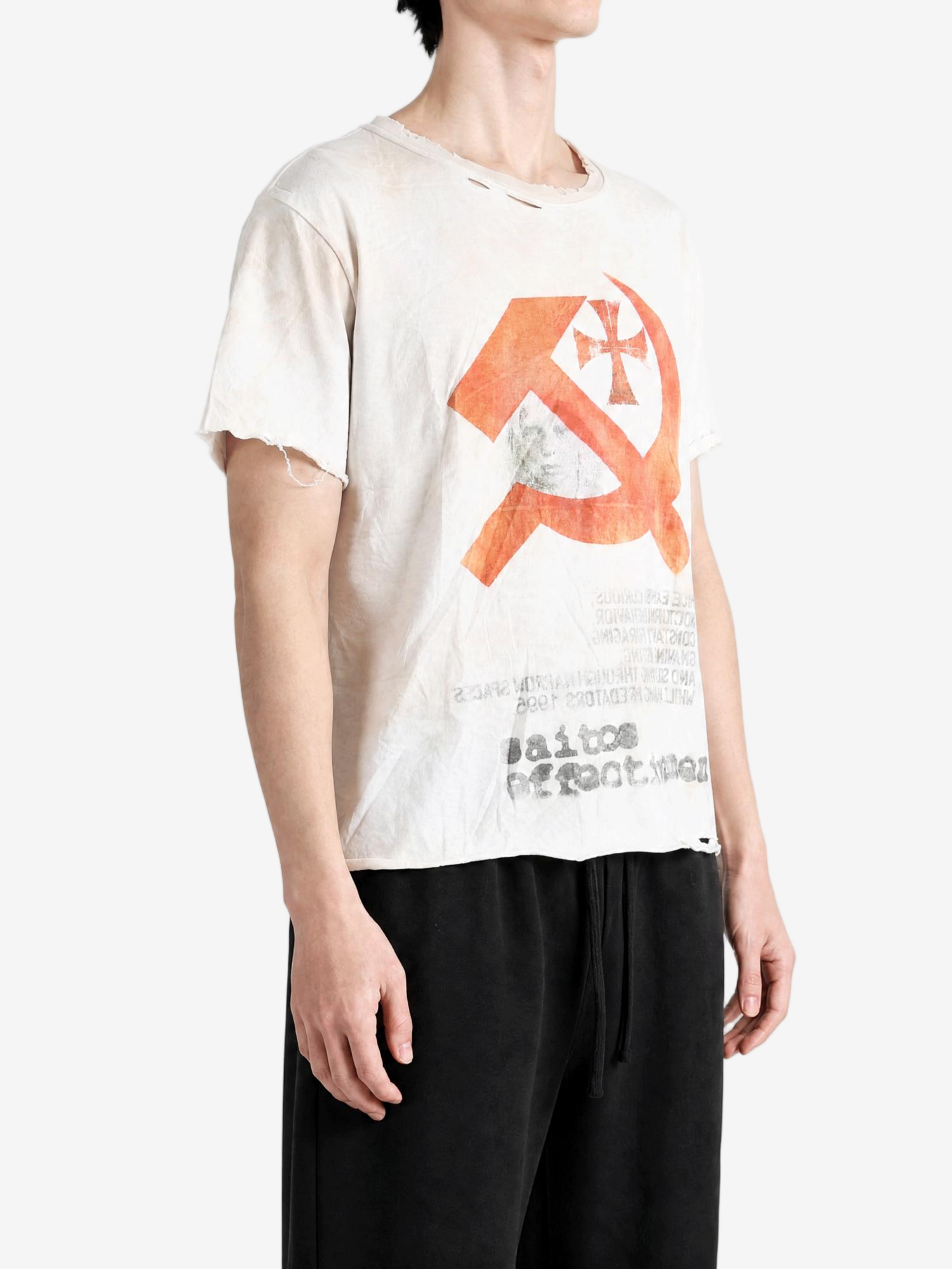 Tan t-shirt worn by a person, showing the t-shirt fit