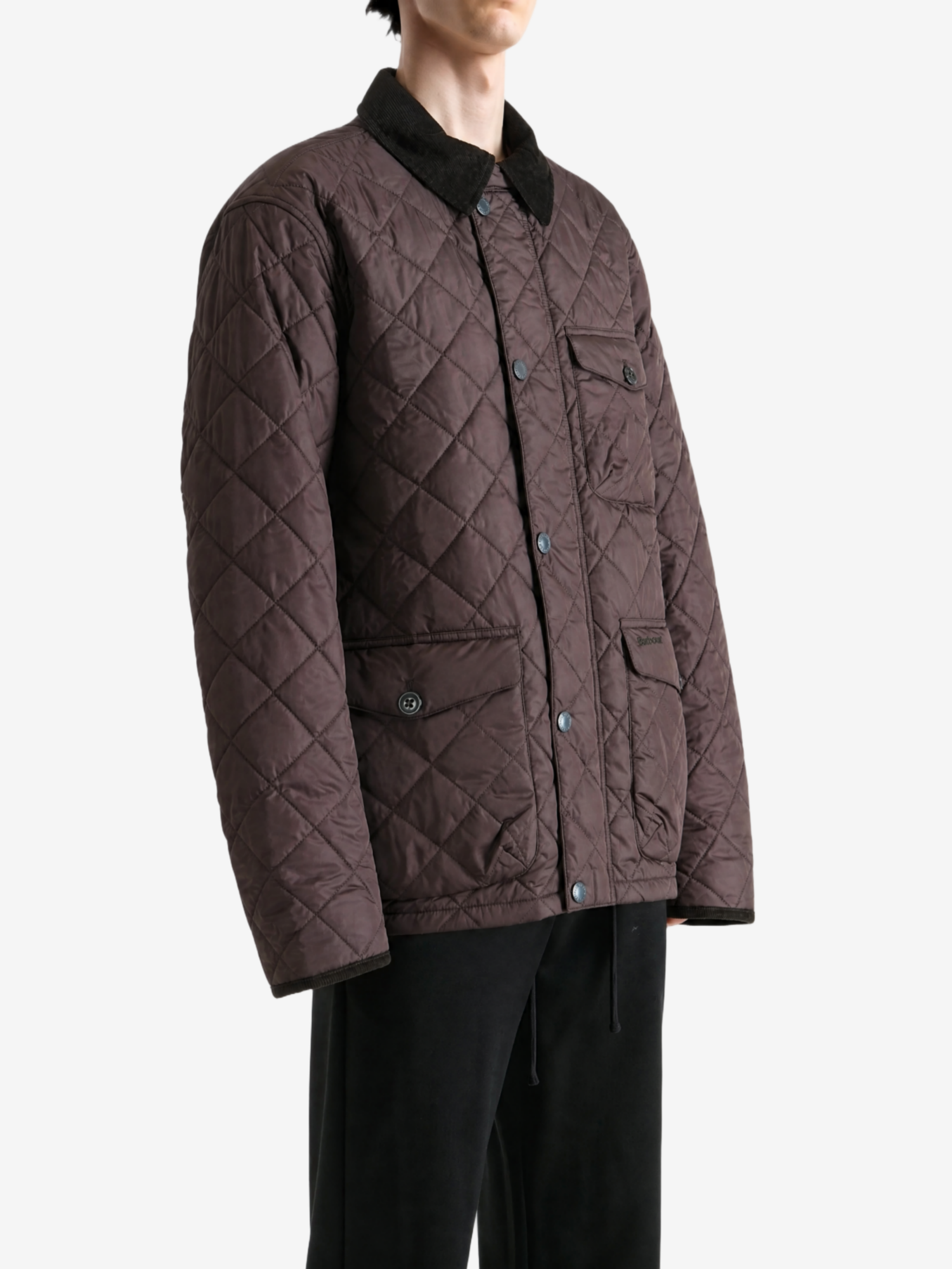 Brown jacket worn by a person, showing the jacket fit
