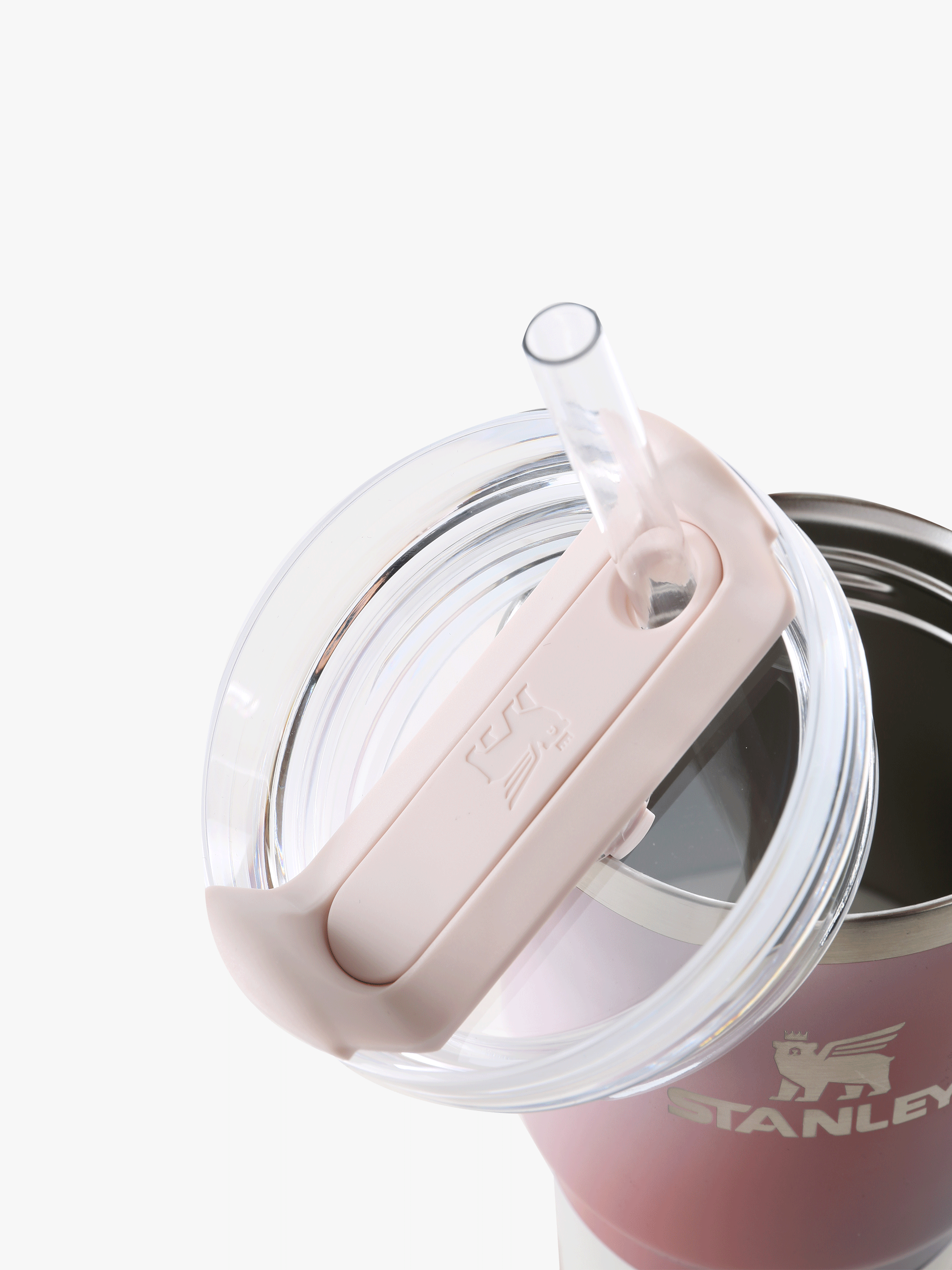 Close up of pink tumbler, showing texture of the stainless steel fabric