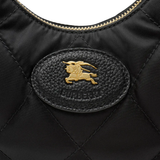 Close up of black bag, showing texture of the leather fabric
