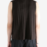 Brown vest worn by a person, showing the vest's fit