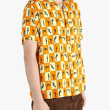 Orange shirt worn by a person, showing the shirt's fit