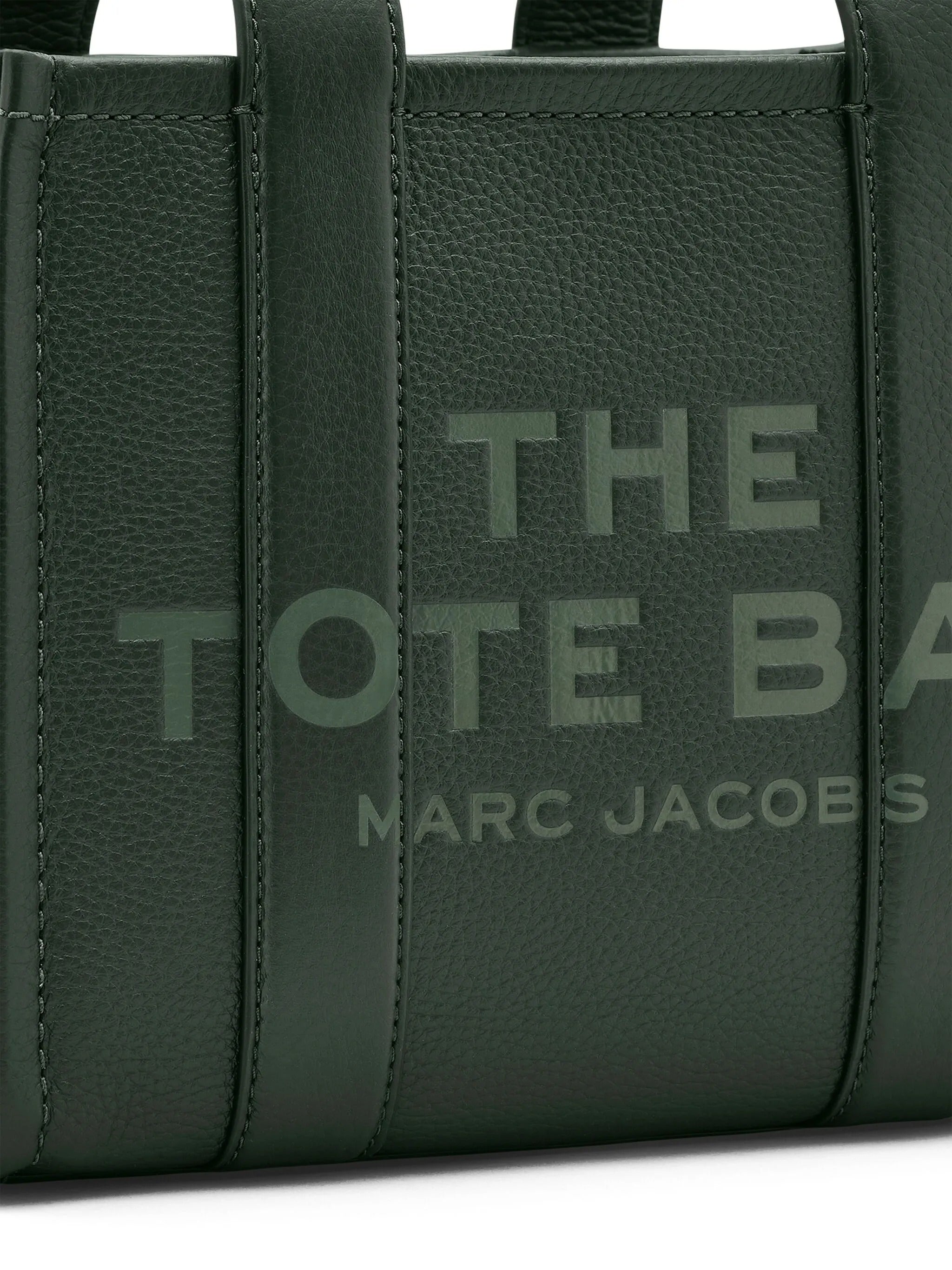 Close up of green bag, showing texture of the leather fabric