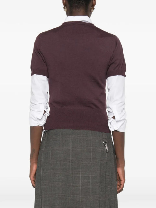 Burgundy top worn by a person, showing the top fit