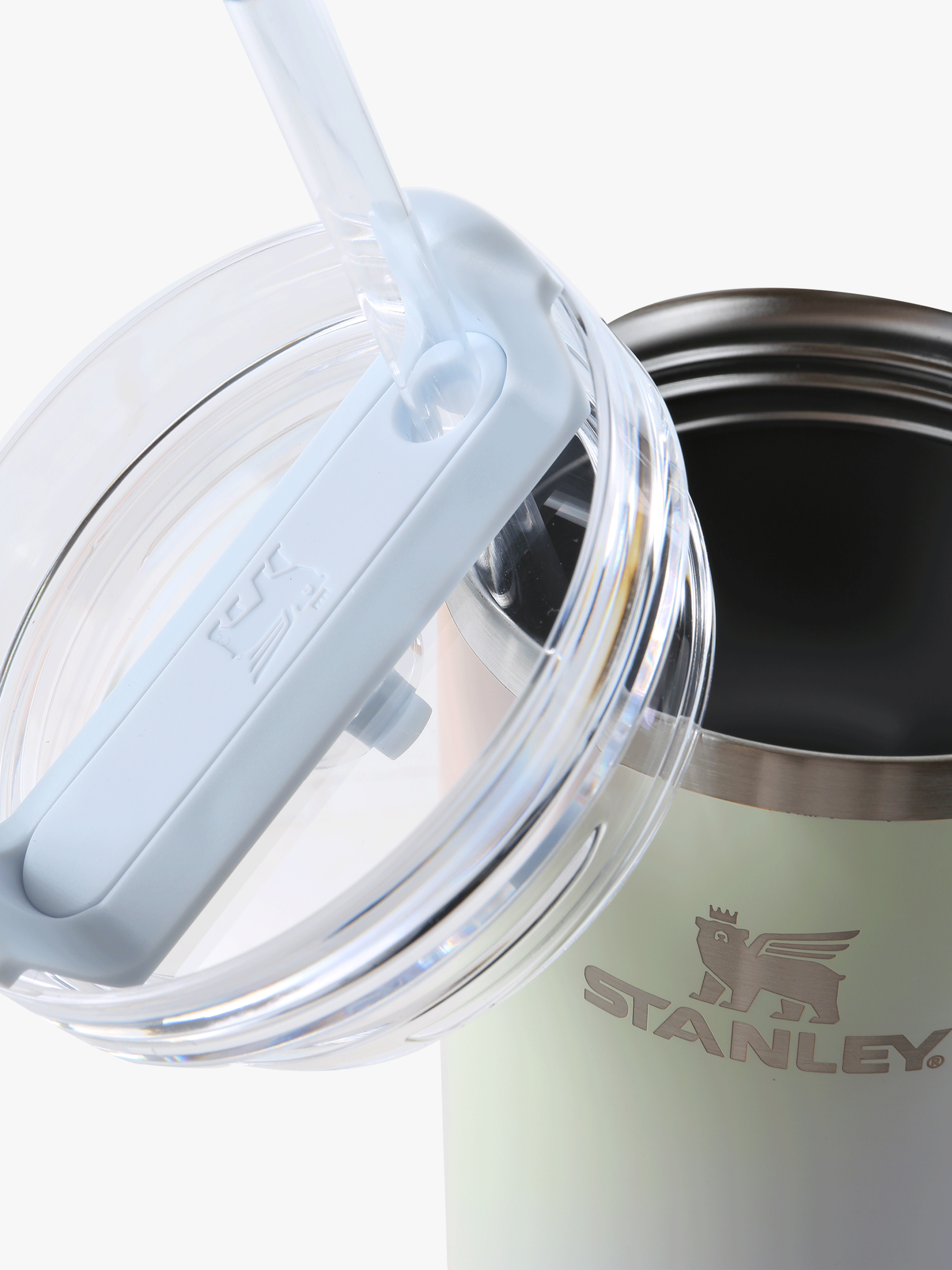 Close up of blue tumbler, showing texture of the stainless steel fabric
