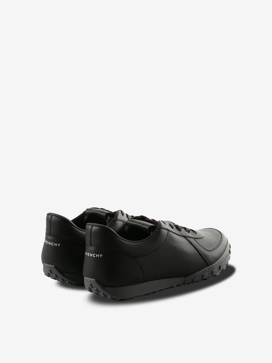 Black sneakers, back view