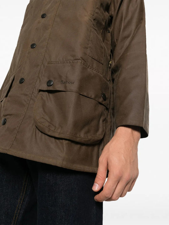 Brown jacket worn by a person, showing the jacket fit