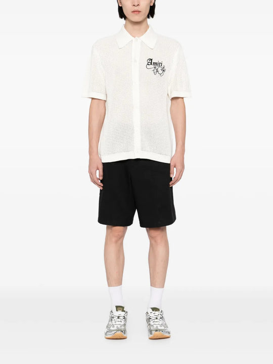 White knitwear, full body view