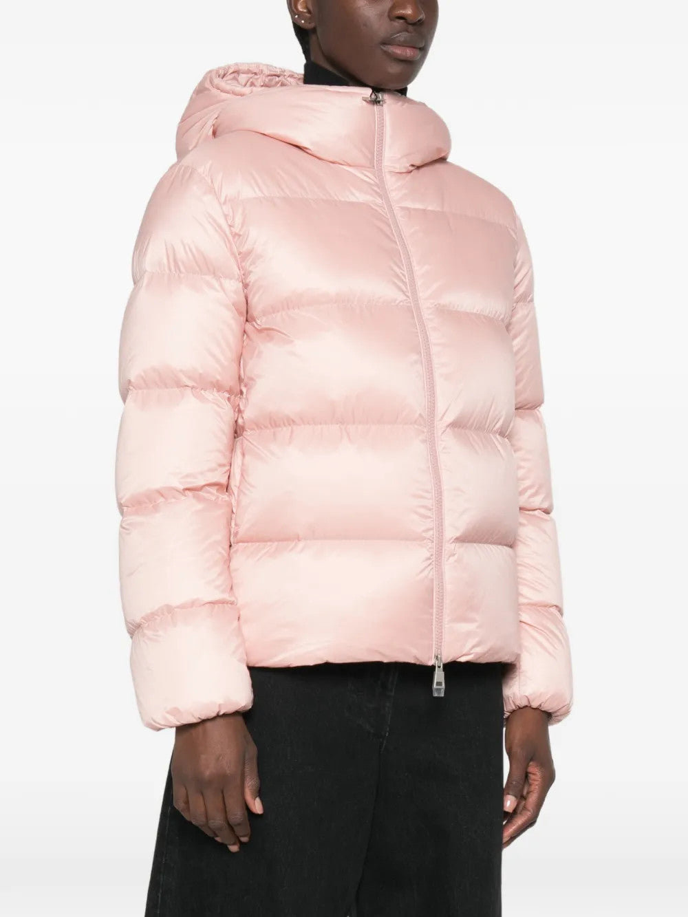 Pink jacket worn by a person, showing the jacket fit