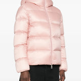 Pink jacket worn by a person, showing the jacket fit
