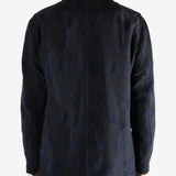 Navy jacket worn by a person, showing the jacket's fit