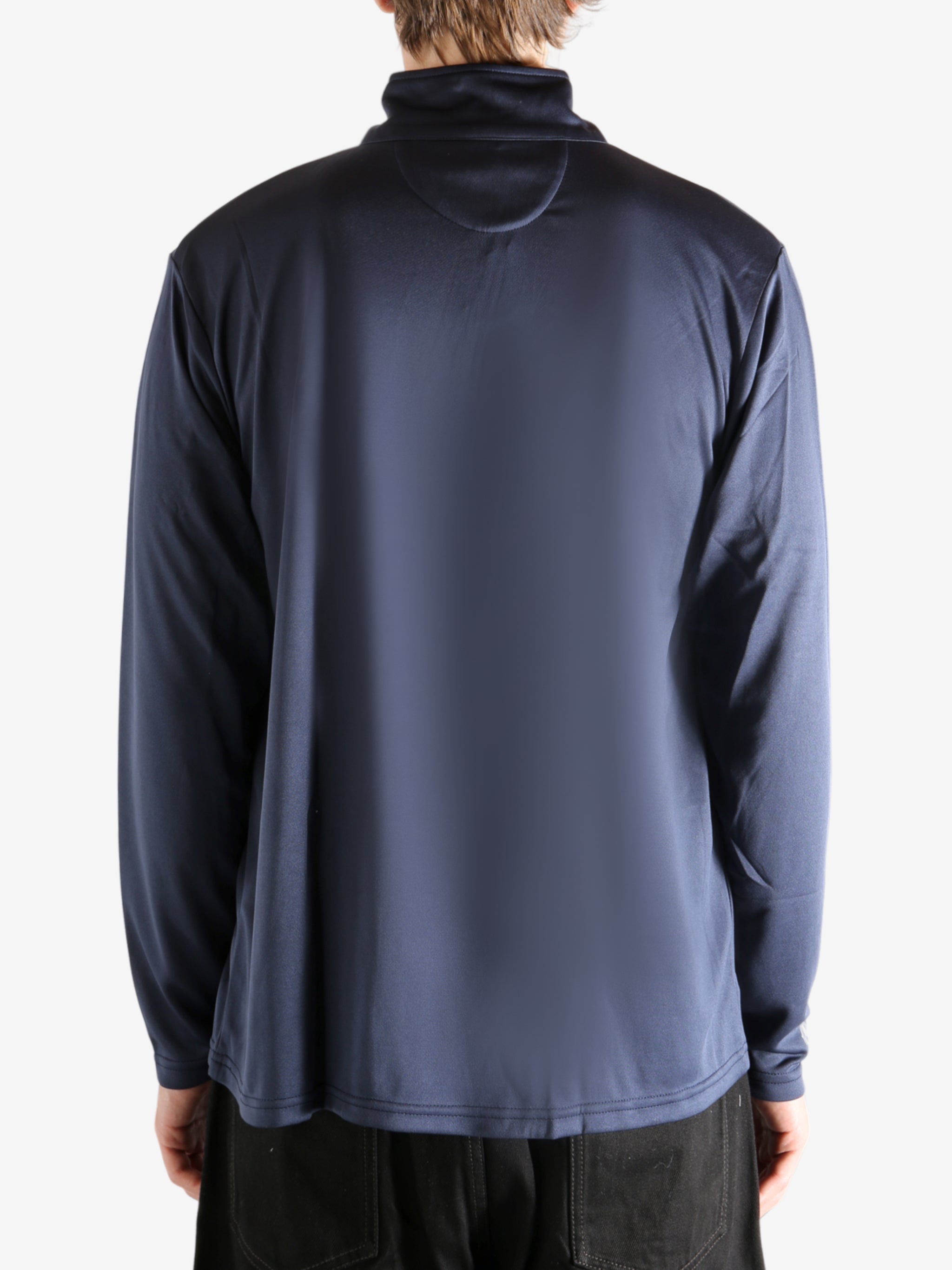 Navy pullover worn by a person, showing the pullover's fit