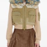 Tan jacket worn by a person, showing the jacket fit