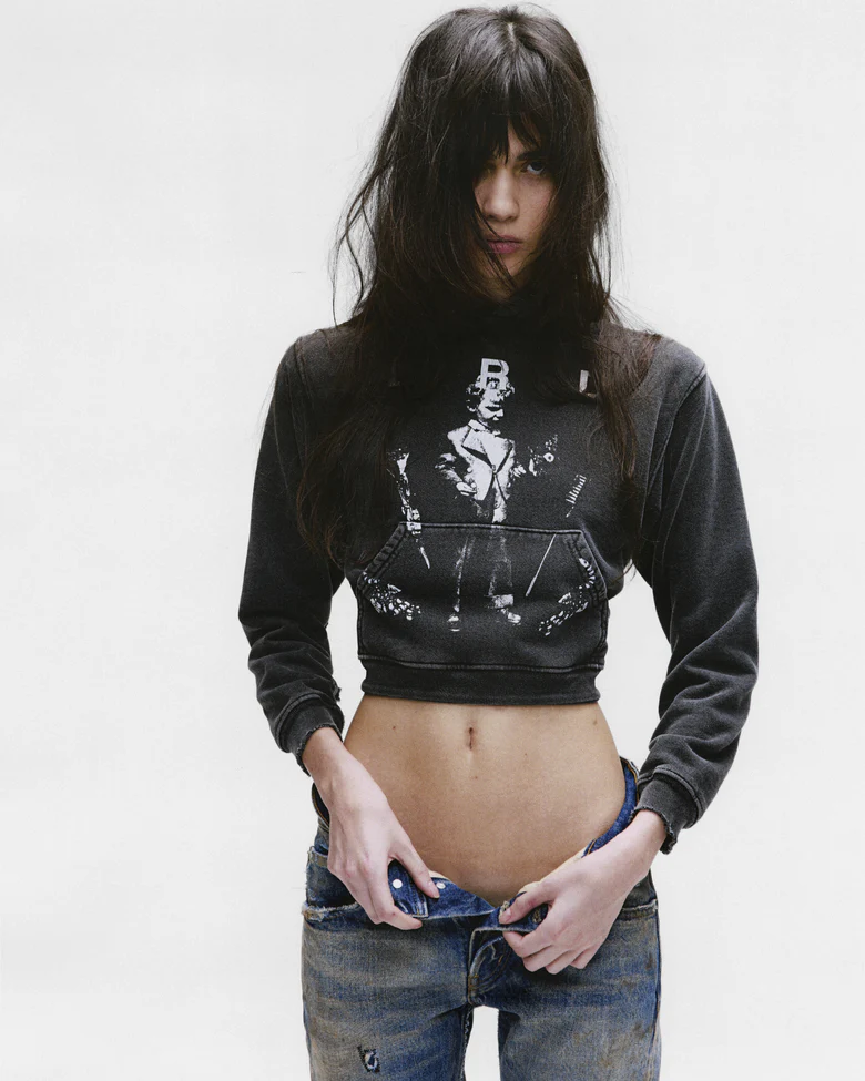 black hoodie,worn by a person,showing the hoodie fit