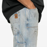 Blue jeans worn by a person, showing the jeans fit