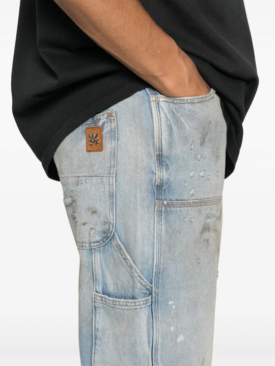Blue jeans worn by a person, showing the jeans fit
