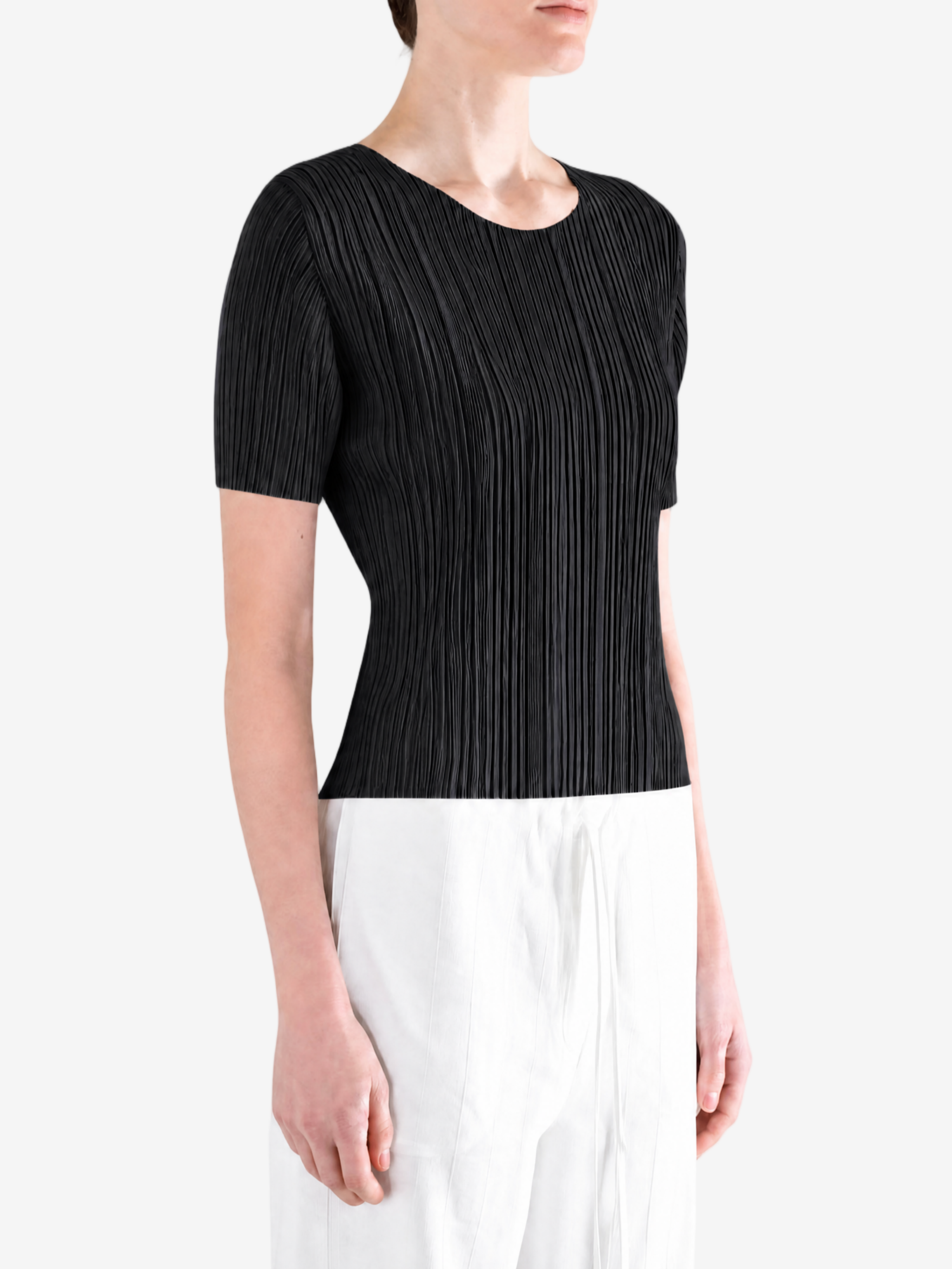 Black shirt worn by a person, showing the shirt fit