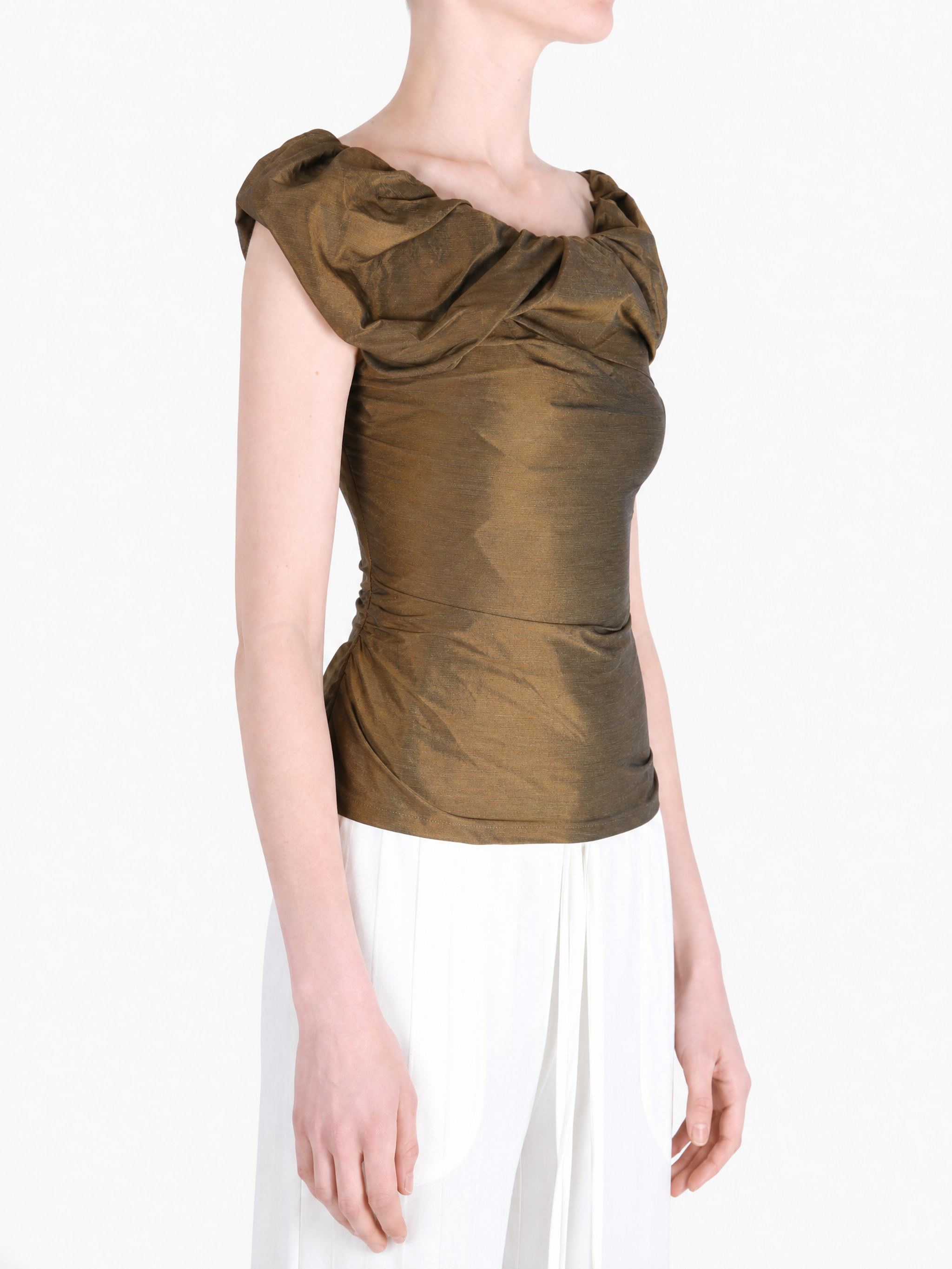 Brown top worn by a person, showing the top fit