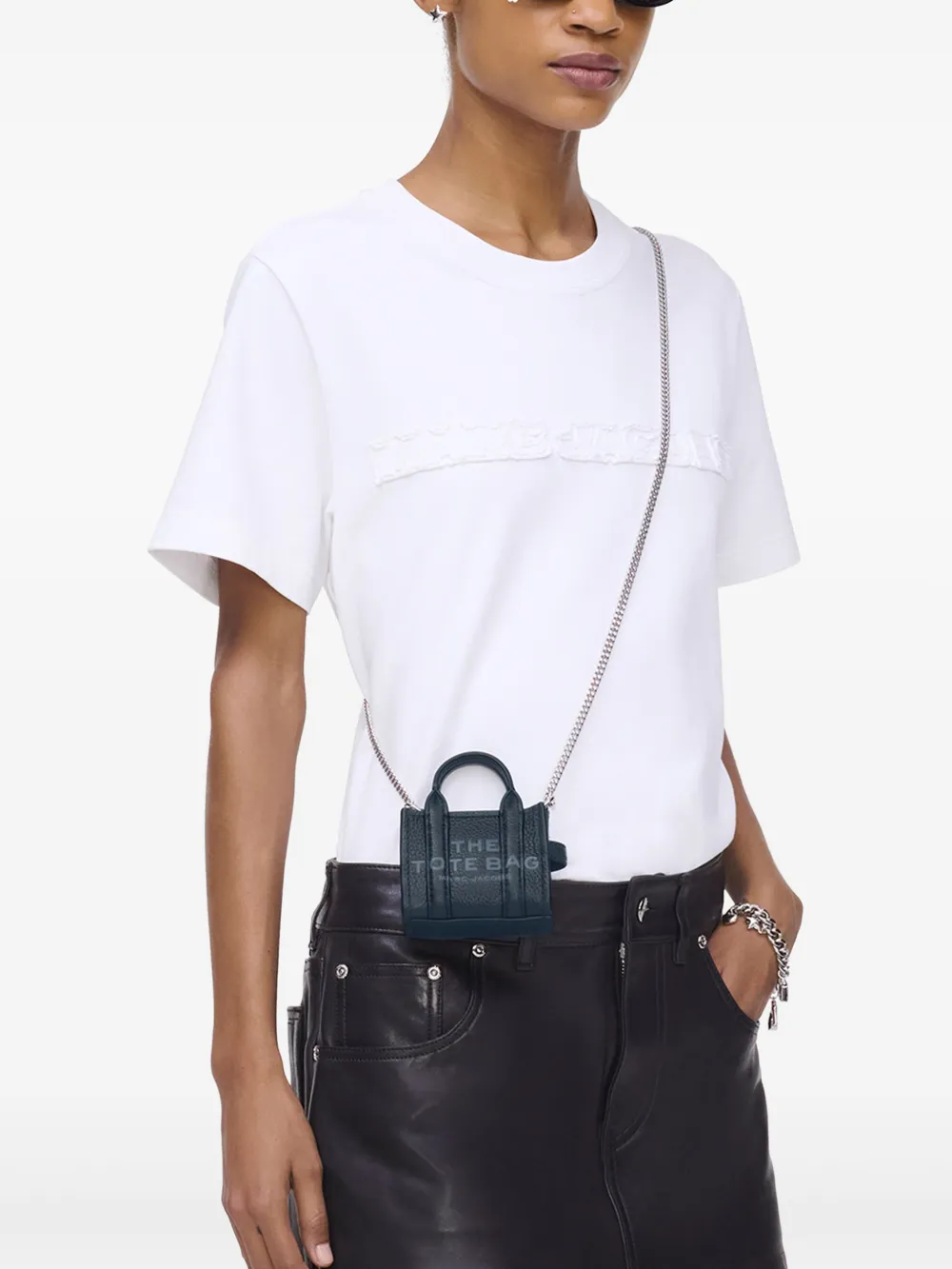 Blue bag worn by a person, showing the bag's fit