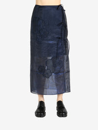 Navy skirt worn by a person, showing the skirt's fit