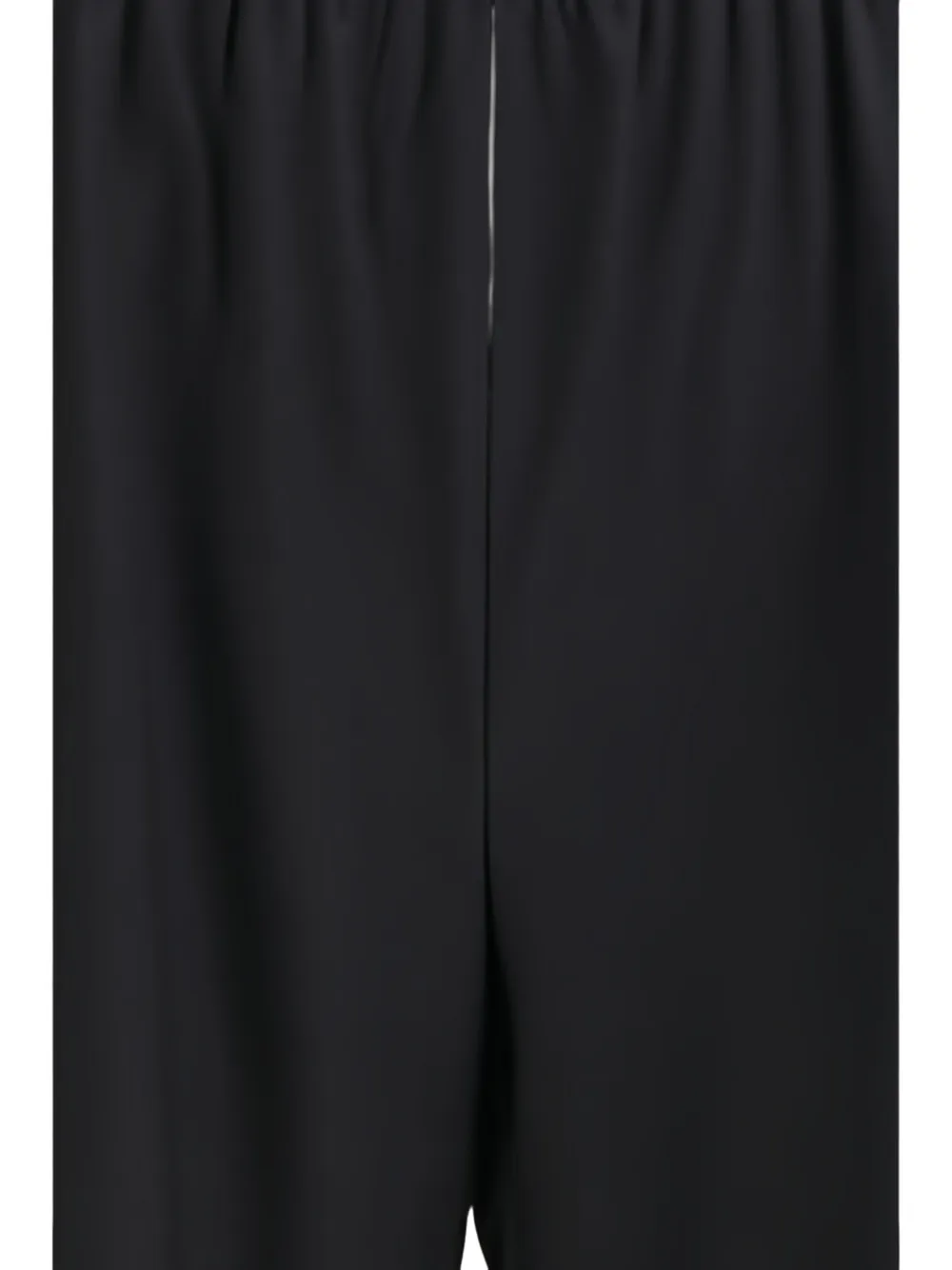 Close up of black pants, showing texture of the virgin wool fabric