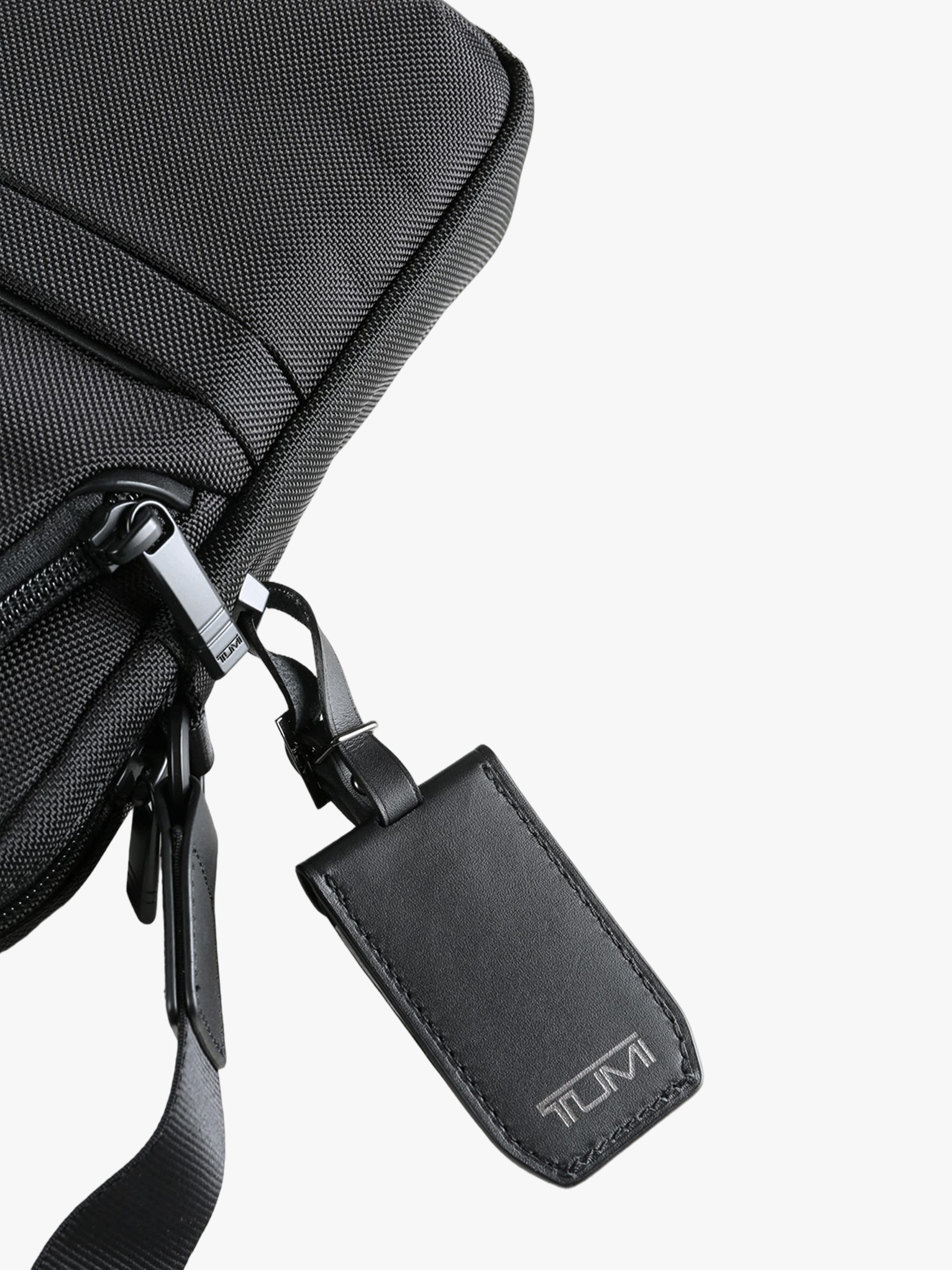 Close up of black bag, showing texture of the nylon fabric