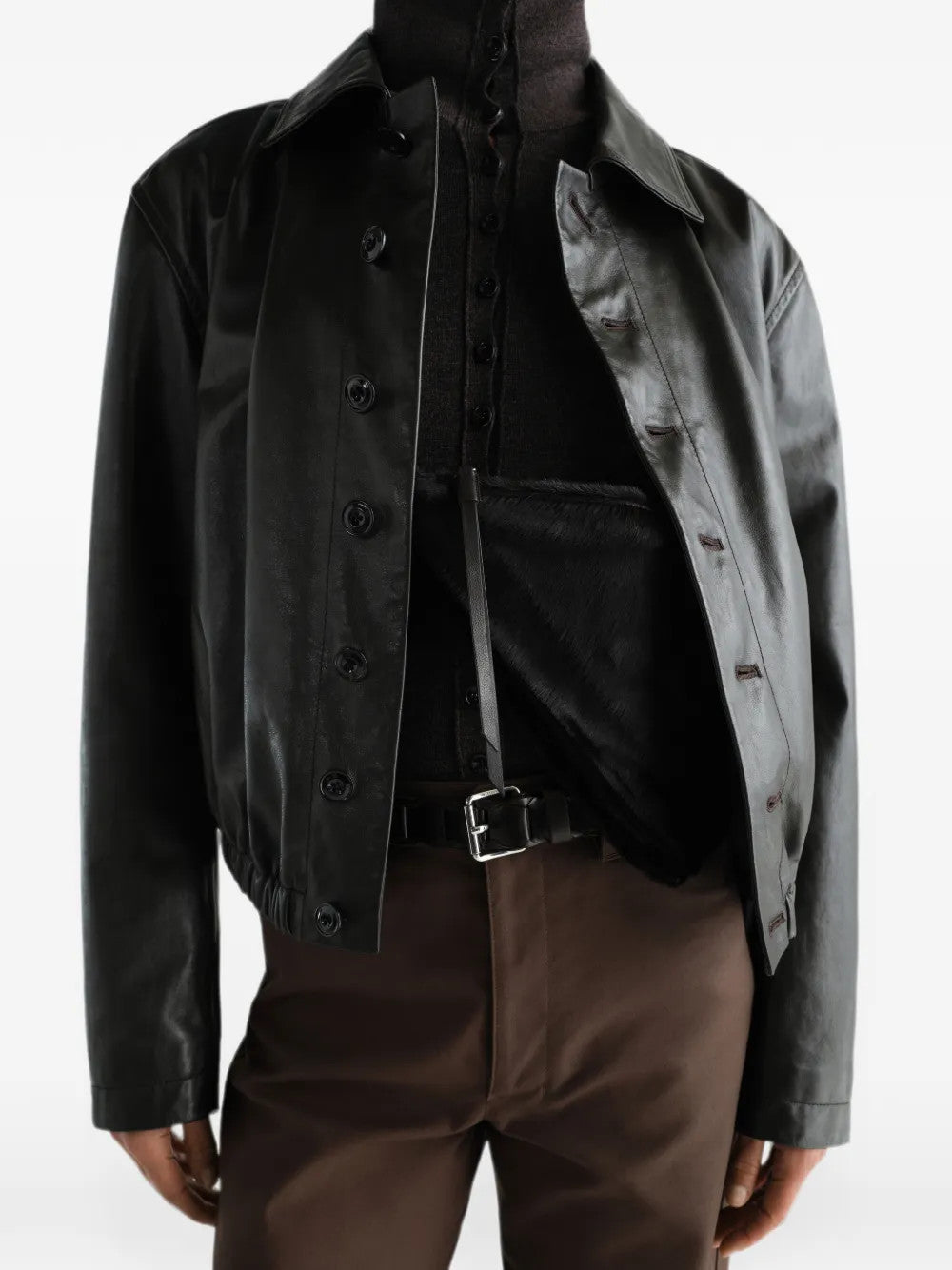 Black bag worn by a person, showing the bag fit