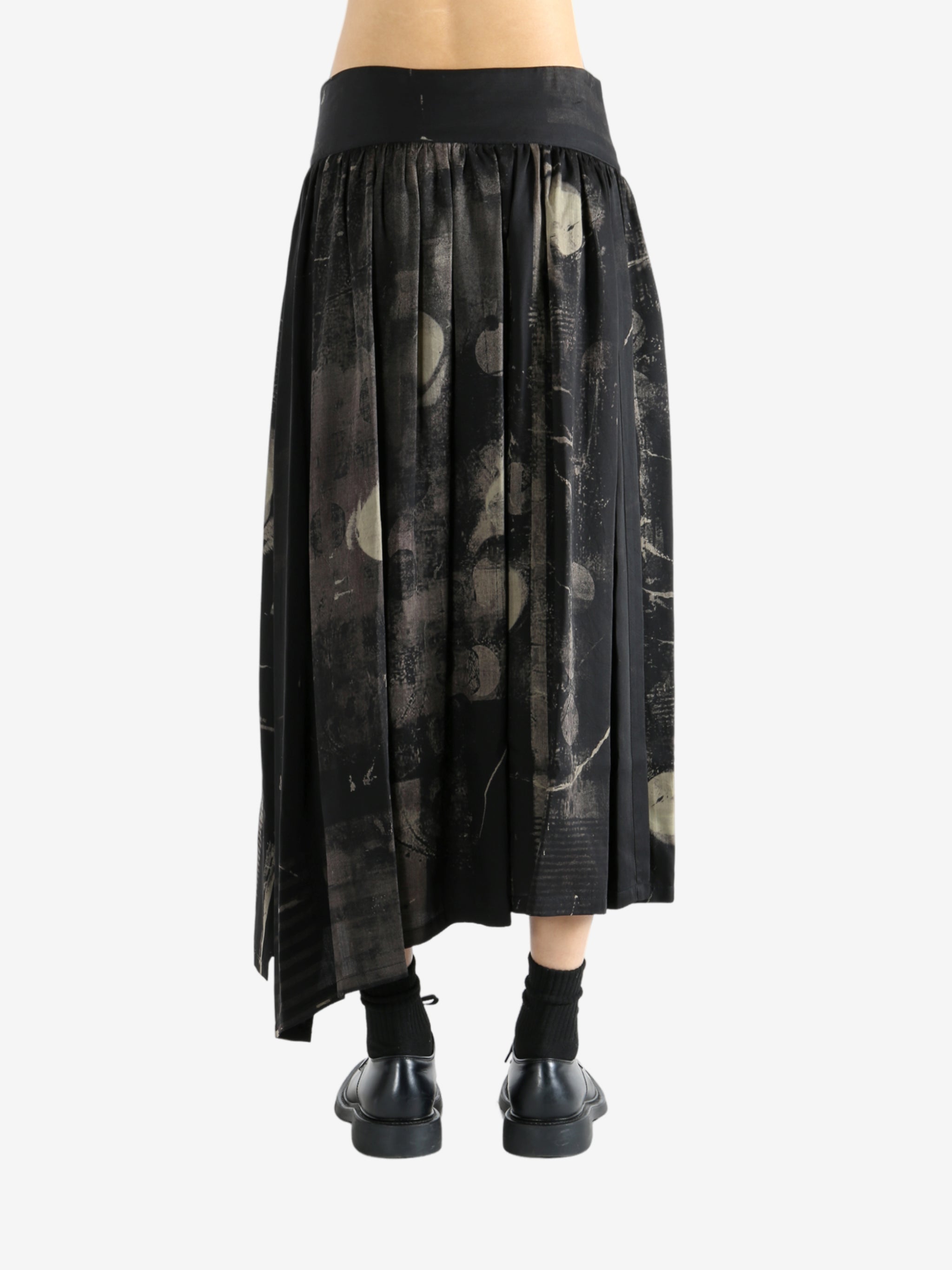 Black skirt worn by a person, showing the skirt fit