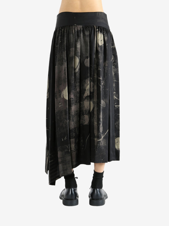 Black skirt worn by a person, showing the skirt fit