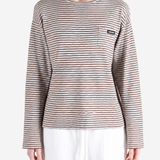 Brown knitwear worn by a person, showing the knitwear fit