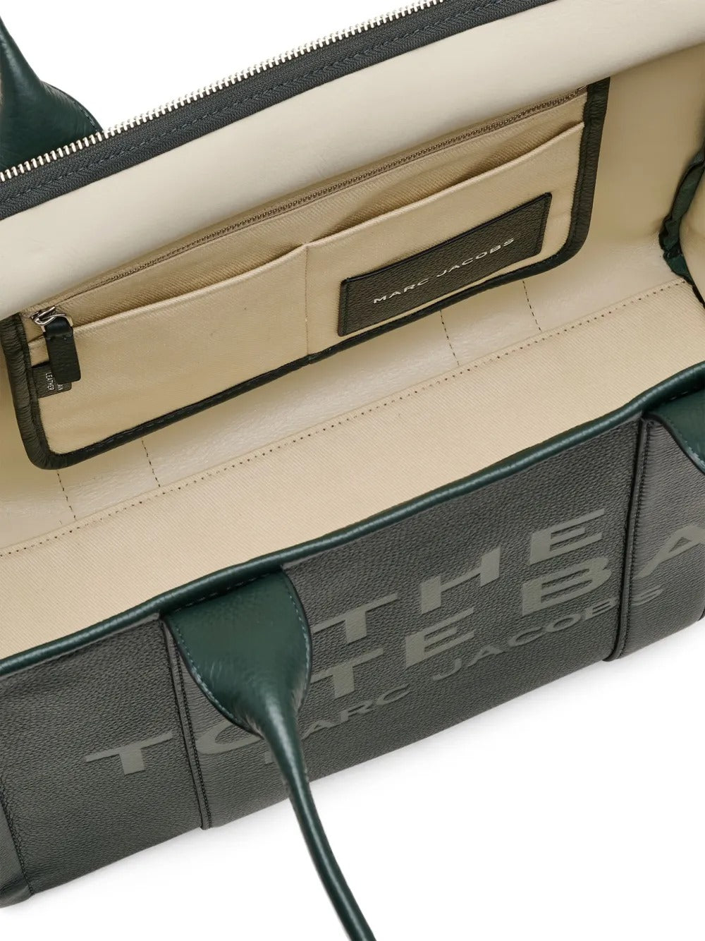 Close up of the green bag, showing texture of the leather fabric
