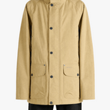 Tan jacket worn by a person, showing the jacket fit