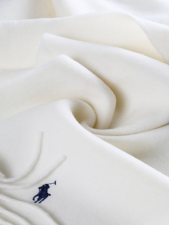 Close up of white scarves, showing texture of the recycled wool and wool fabric
