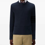 Navy pullover worn by a person, showing the pullover's fit