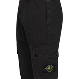 Close up of black pants, showing texture of the Cotton fabric