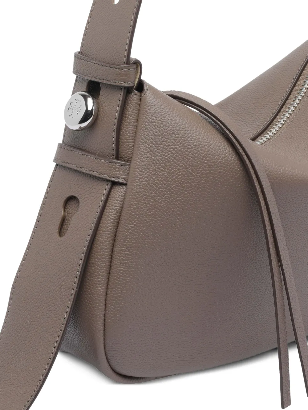Close up of brown bag, showing the pin detail